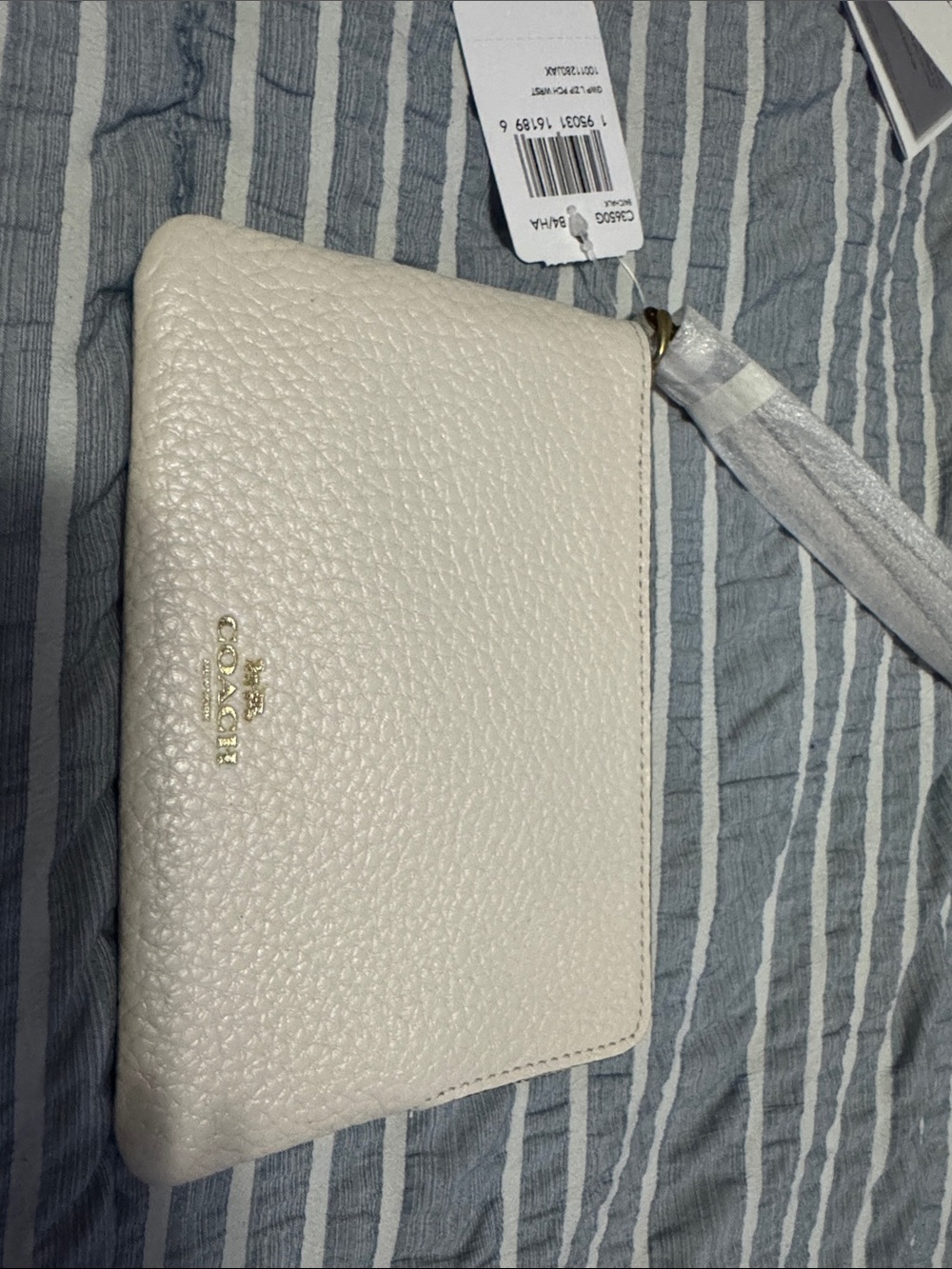 COACH Cream Pebbled Leather Wristlet Clutch with Gold Logo